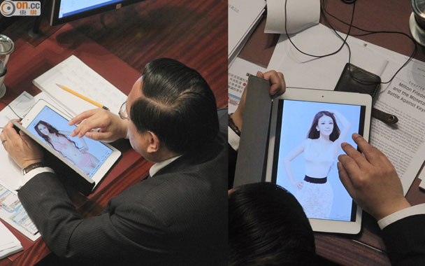Hong Kong Lawmaker Snapped Looking At Bikini Photos During Budget Speech