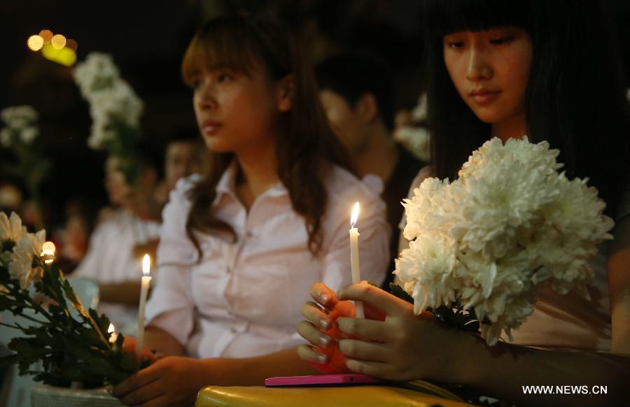 China Daily tells relatives of MH370 passengers to get over it