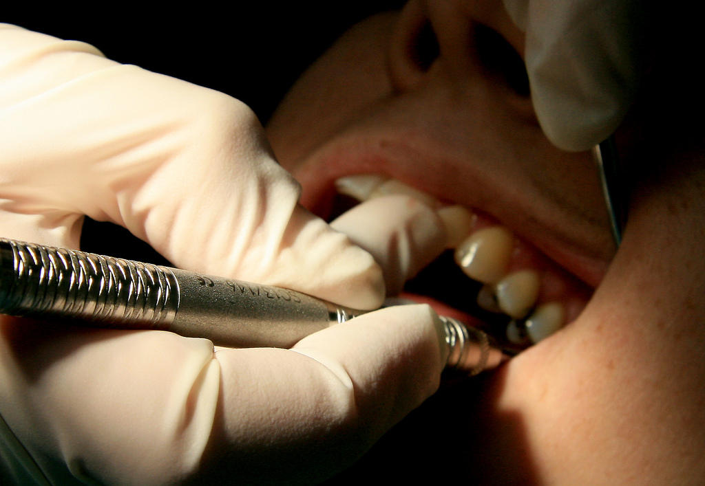 Hong Kong woman to sue dentist after surgery leaves her 'paralysed'