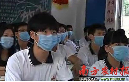 Students at high school don face masks to escape foul smell