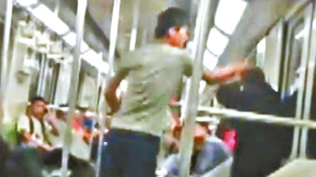 Police launch search for young man who attacked old beggar on Shanghai Metro