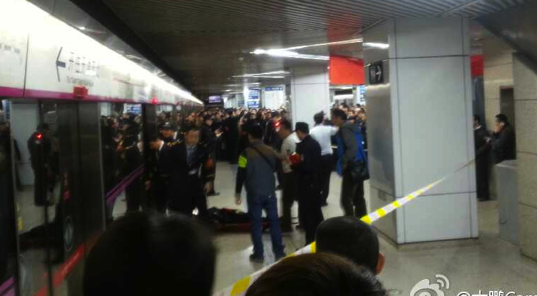 Woman killed by Beijing Subway platform screen door