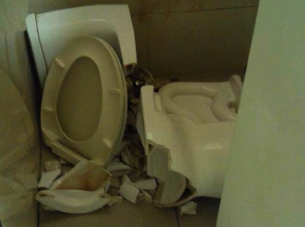 Traveler butthurt after airport toilet disintegrates beneath him