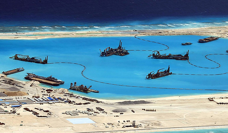 China says it has stopped controversial land reclamation in South China Sea